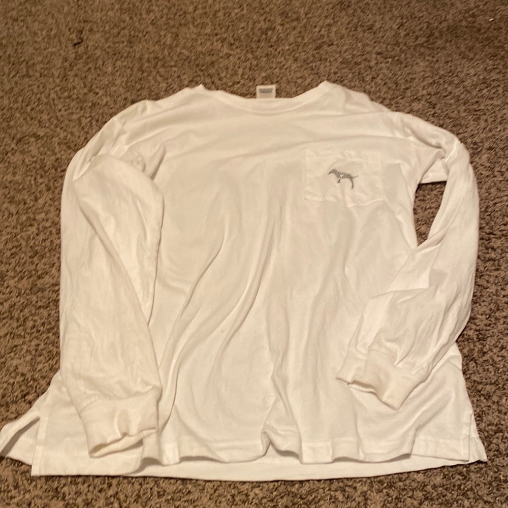 This is a cute comfy shirt with a pocket and a cute print on the back